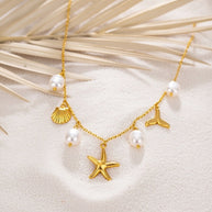 Zara v2 ~ Shell and fin charm necklace image 1