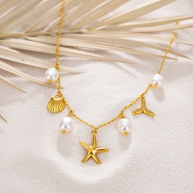 Zara v2 ~ Shell and fin charm necklace image 1