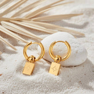 Rosie ~ Starburst huggie earrings image 3