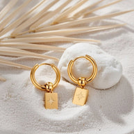 Rosie ~ Starburst huggie earrings image 0